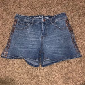 Bronze detailed jean shorts